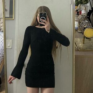 Long sleeve black open back mini dress